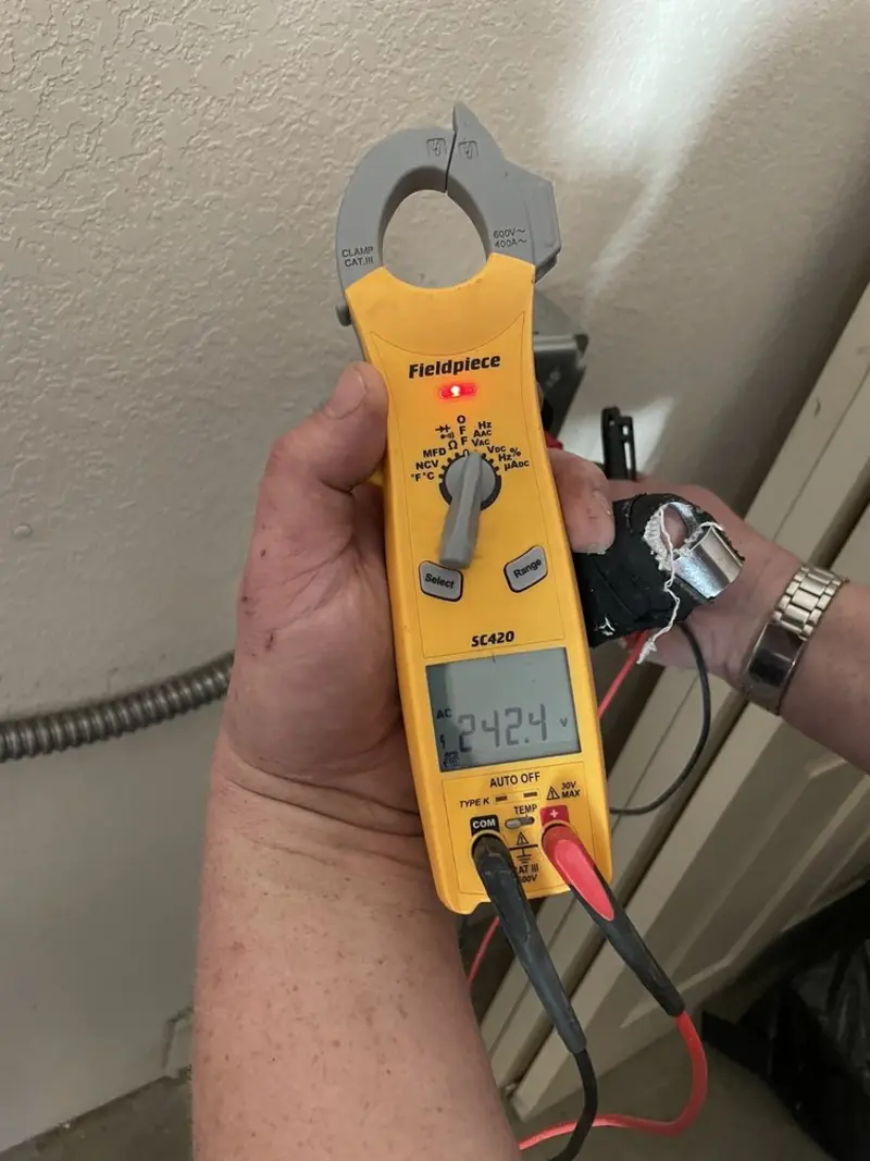 Voltage testing with clamp meter during Generator Installation in Weaverville